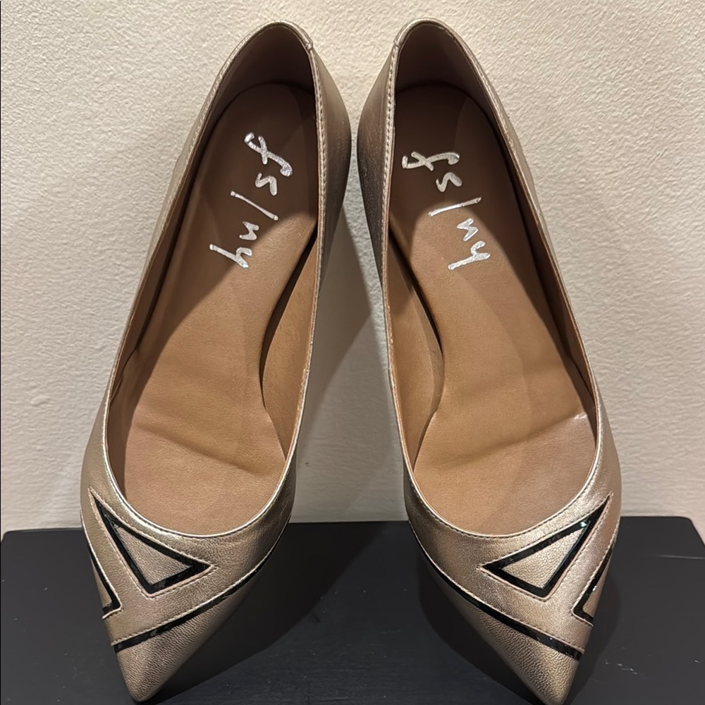 French Sole Metallic Gold Pointed Toe Flats with Black Trim